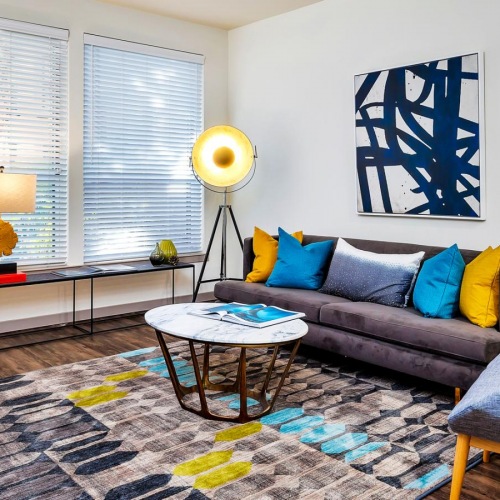 Beautiful living areas to match your lifestyle a living room with a couch and a table